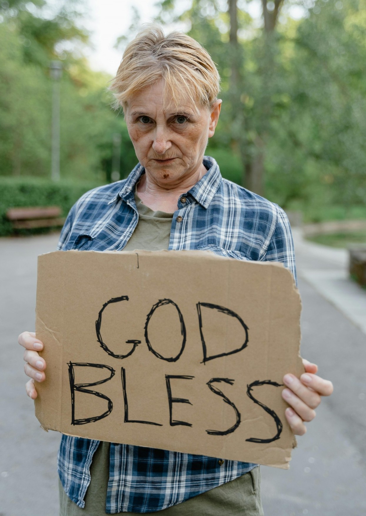 Homelessladygodblesssign