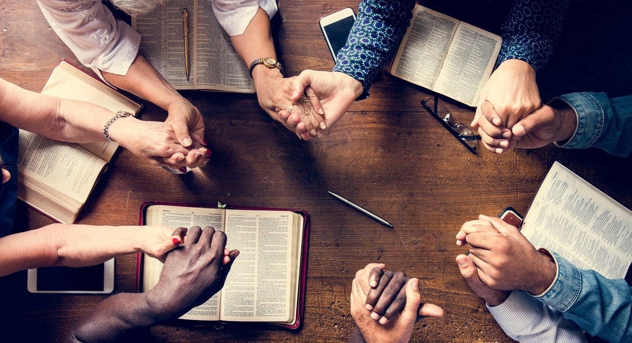 Hands Prayer Bible Study Adult Table Adobestock 213746761